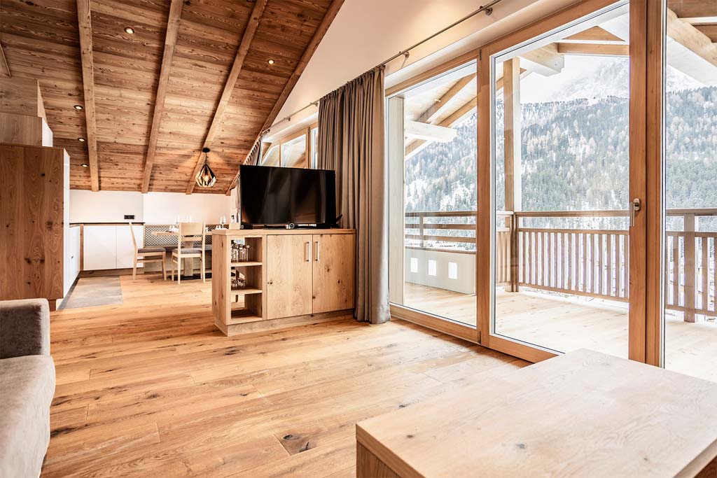 Luxusferienwohnung Chalet Dolomiti - Wohnzimmer